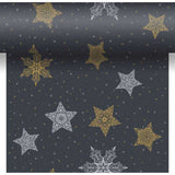 Pattern of gold and silver stars on a black background