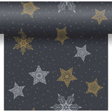 Decorative paper with gold and silver star patterns on a black background