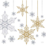 Decorative snowflakes in gold and silver on a white background